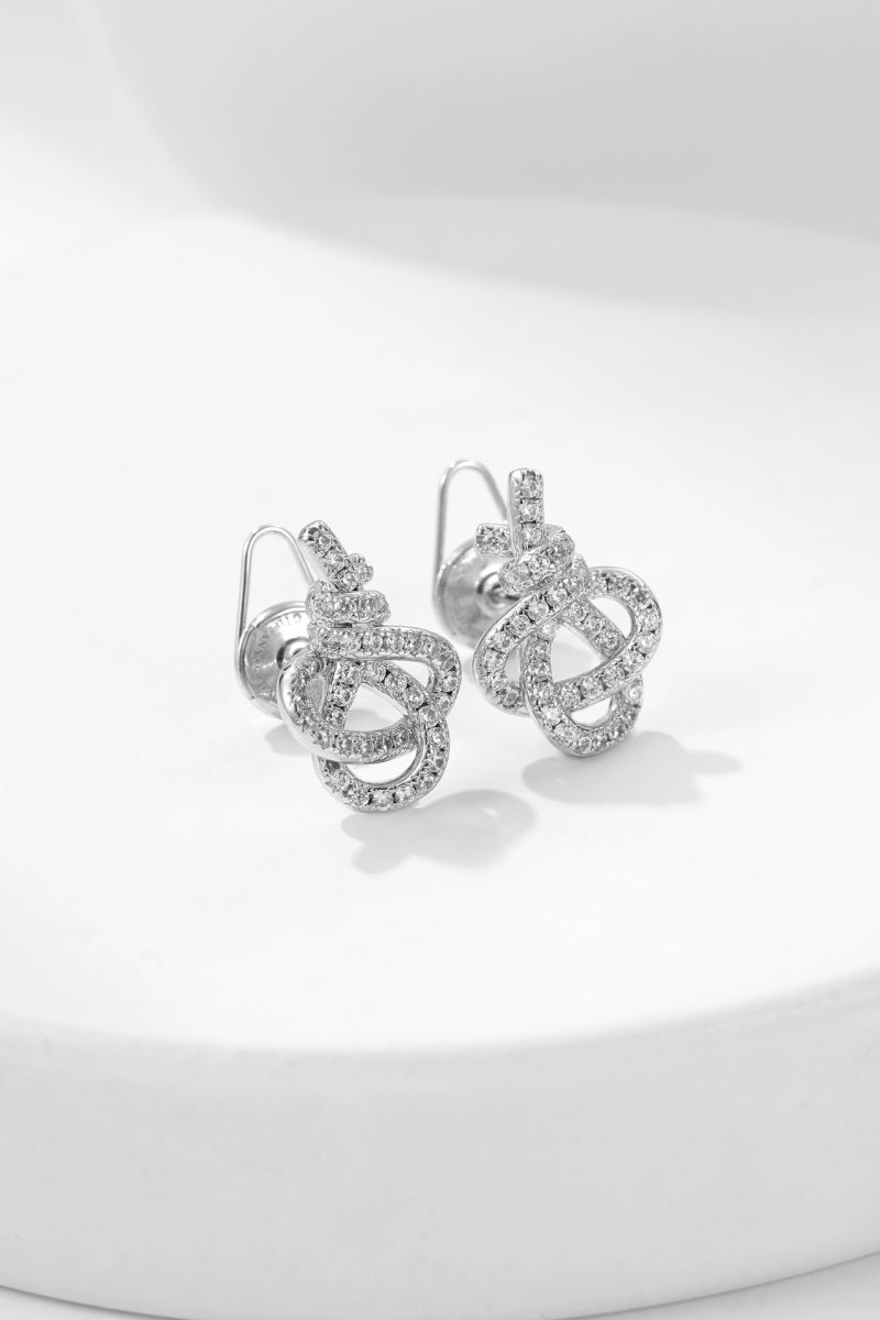 T*f*ny earrings